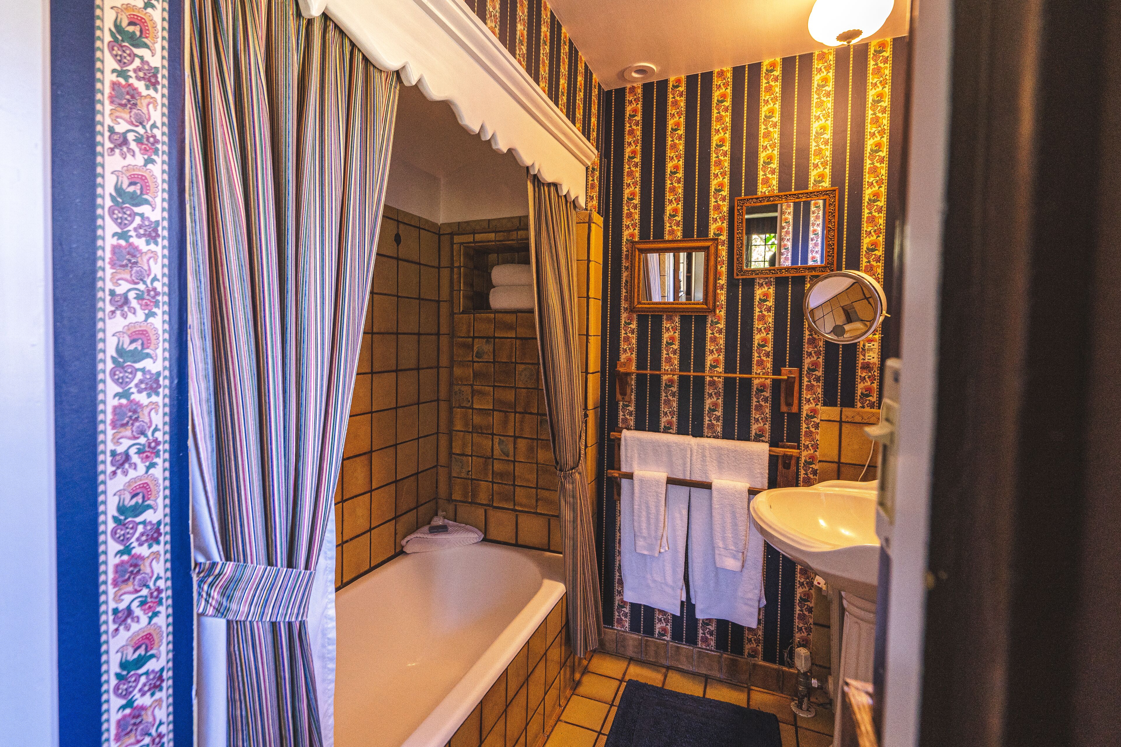 The Library | Bathroom | Hair dryer, bathrobes, slippers, towels