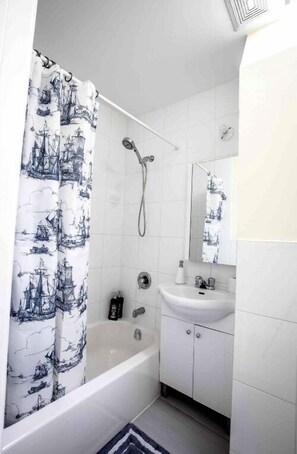 Hair dryer, towels, soap, shampoo