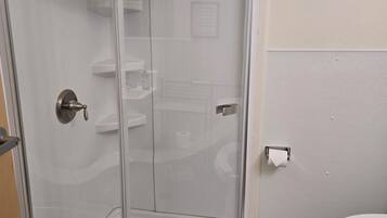 Shower, hair dryer, towels, toilet paper