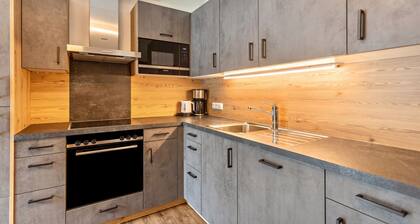 Apartamento vacacional 'Apartment mit Blick Auf Die Berge' con vistas a la montaña, jardín y WiFi.