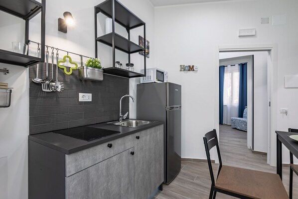 Microondas, placa de cocina