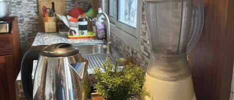 Fridge, stovetop, electric kettle, blender