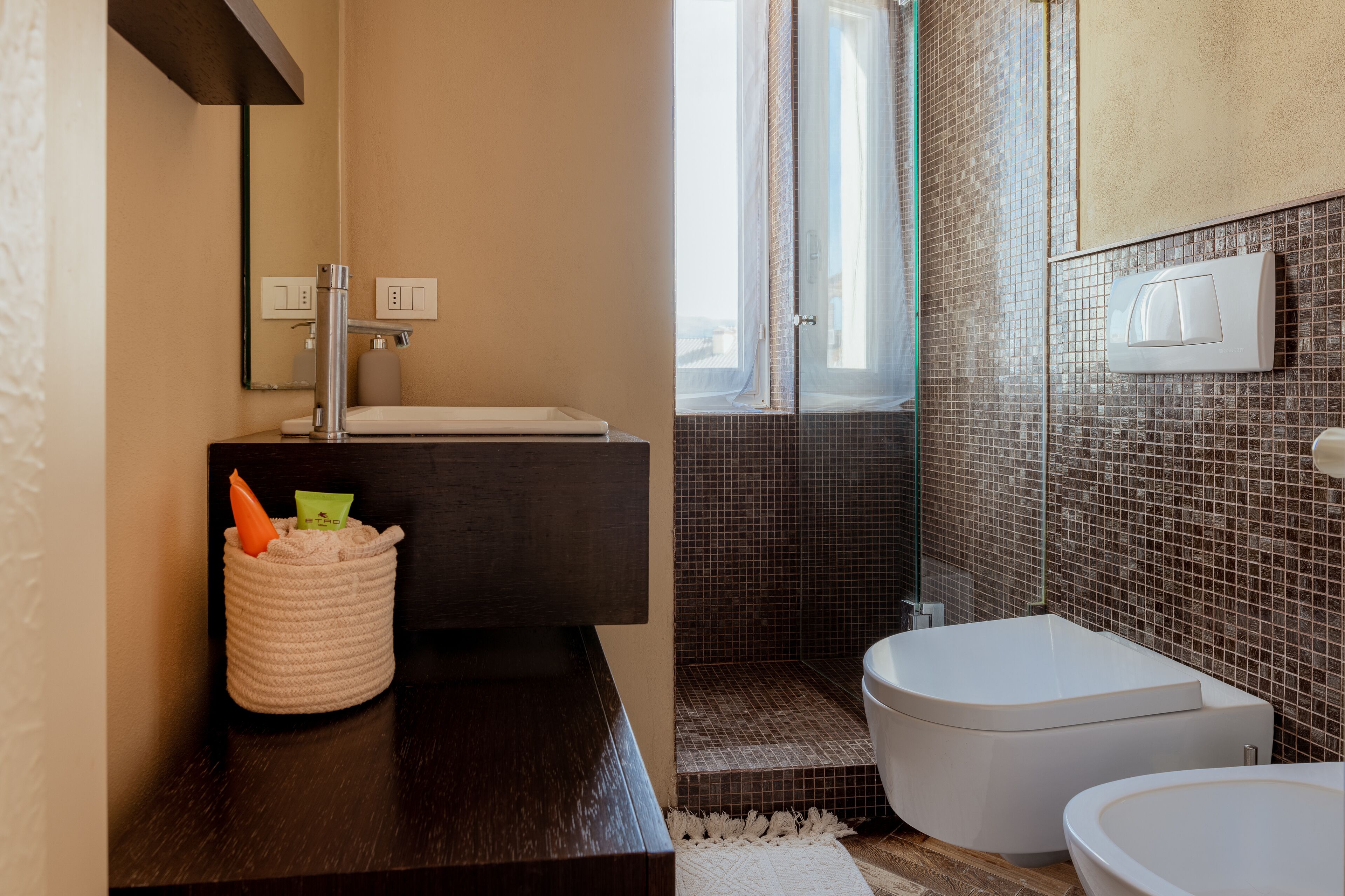 Bidet, towels, toilet paper