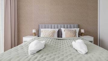 1 bedroom, desk, iron/ironing board, travel crib