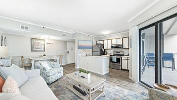 Family Condo, 2 Bedrooms, Balcony, Beachfront | Living room | 50-inch Smart TV with digital channels, TV