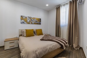 1 chambre, fer et planche à repasser, lit parapluie, Wi-Fi gratuit
