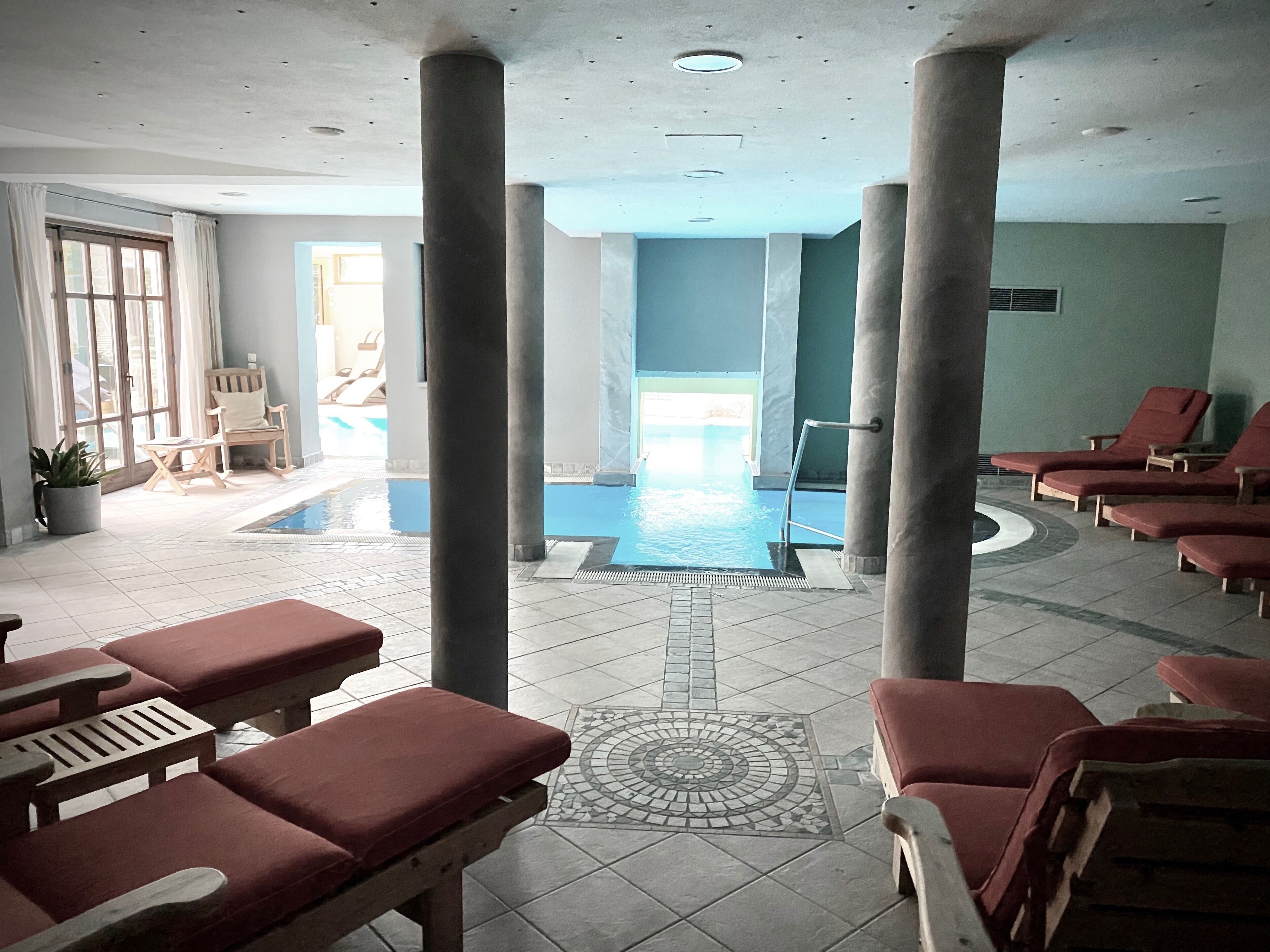 Indoor pool, open 7:00 AM to 9:00 PM, pool loungers