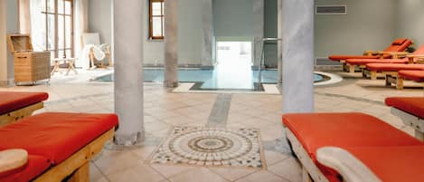 Indoor pool, open 7:00 AM to 9:00 PM, sun loungers