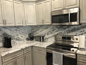Fridge, microwave, oven, stovetop - Newly constructed VIP Leval Rooftop Townhome (Tallahassee)