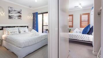 2 bedrooms, desk, iron/ironing board, travel crib