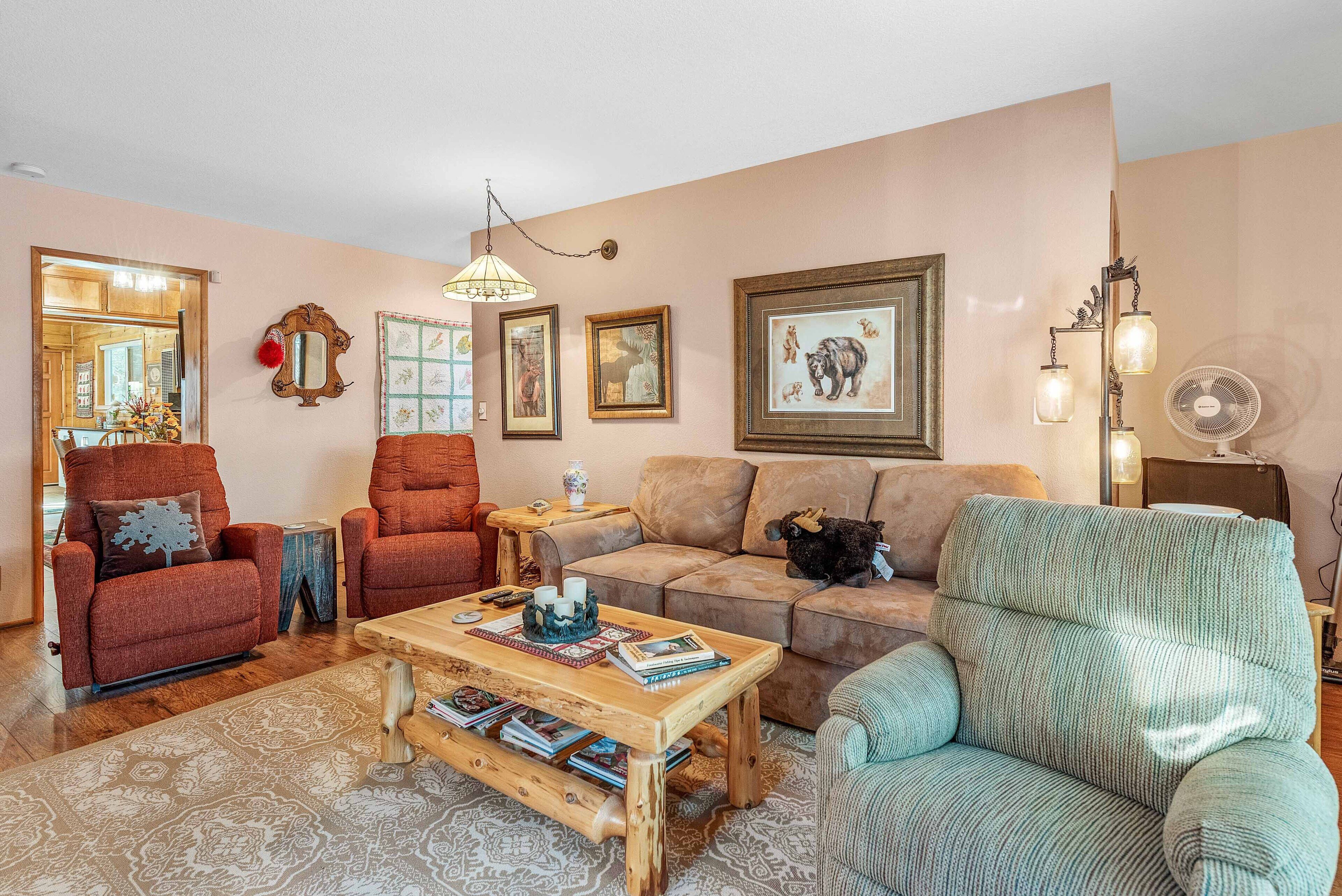 Updated pet-friendly home with fenced yard, deck, near attractions and more!