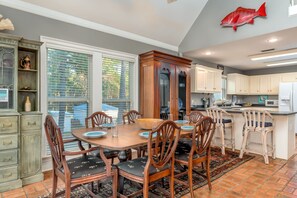 Enjoy meals in this dining area with a large table and six comfortable chairs.