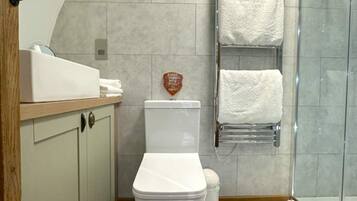 Shower, free toiletries, hair dryer, bathrobes