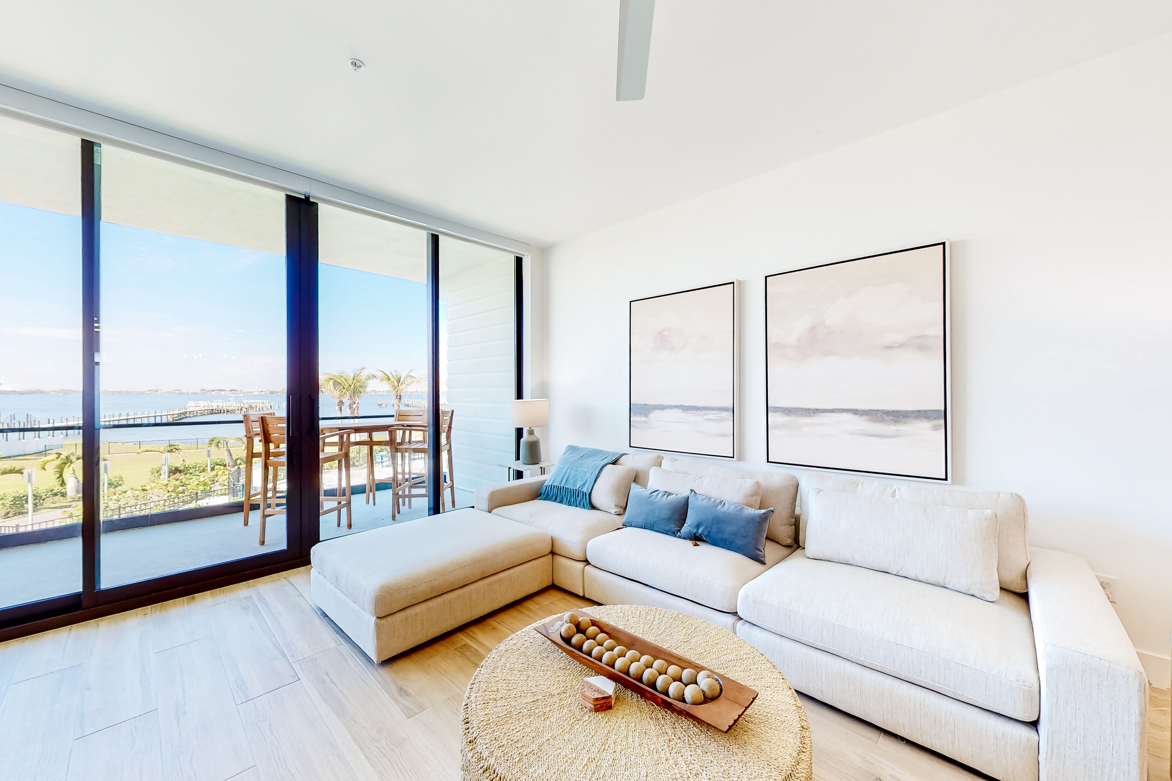 Inviting waterfront apartment with pool, beach access, hot tub, & W/D