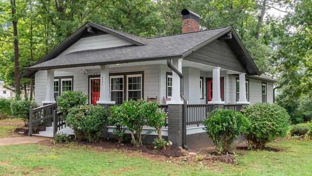 A single-story house with a front porch, a chimney, and a small front yard. - "Mt. Holly Haven" — Near Whitewater Center, Belmont Abbey, Catawba River, CLT (Mount Holly)