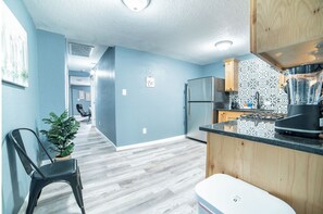 Microwave, oven, dining tables