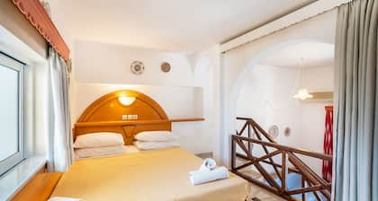 Holiday Home 'Olympus Tilos Apt Double A1 ' with Mountain View, Wi-Fi and Air Conditioning