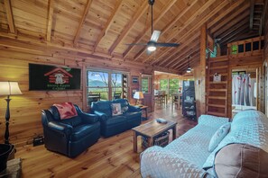 Smart TV, fireplace, foosball, books