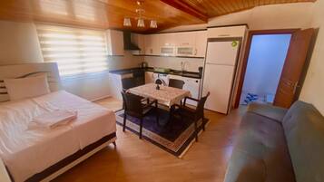 Family Apartment | Living area | 102-cm Smart TV with satellite channels, TV