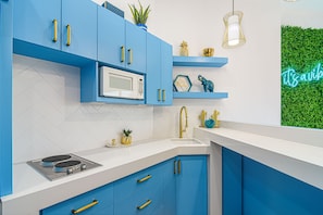 Fridge, microwave, stovetop, coffee/tea maker