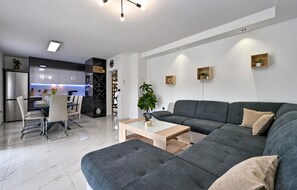 Smart TV, fireplace, foosball