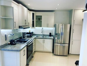 Private kitchen - Vacaciones_en_sfm (San Francisco de Macoris)