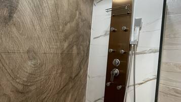 Shower, bidet, towels, soap