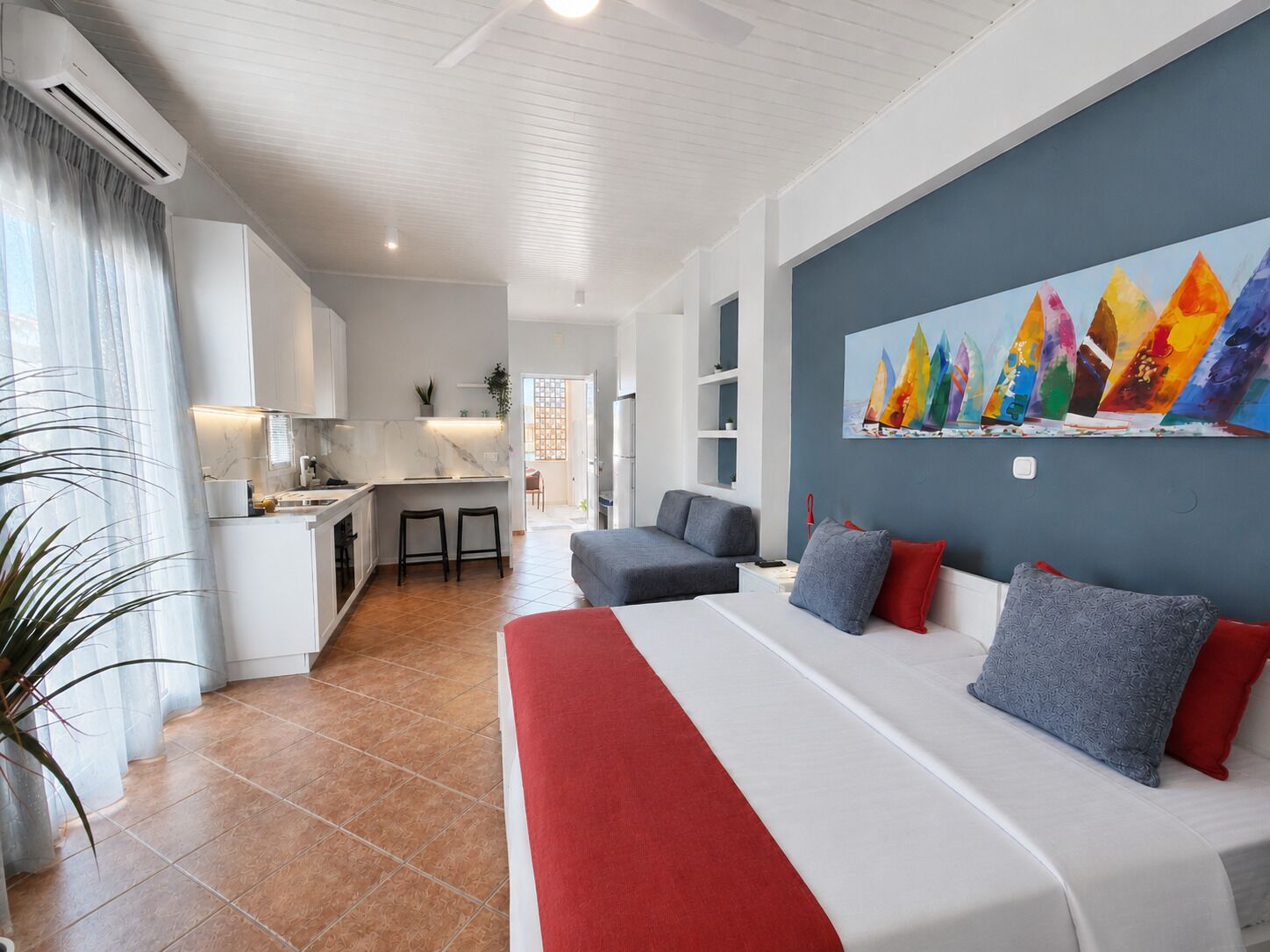 Deluxe Studio, Partial Sea View | Down comforters, memory foam beds, in-room safe, individually decorated