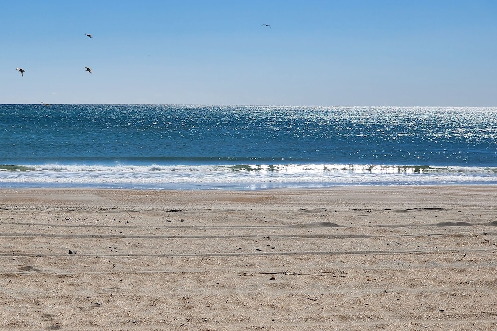 Oceanfront complex, two pools, beach access, and king bed!