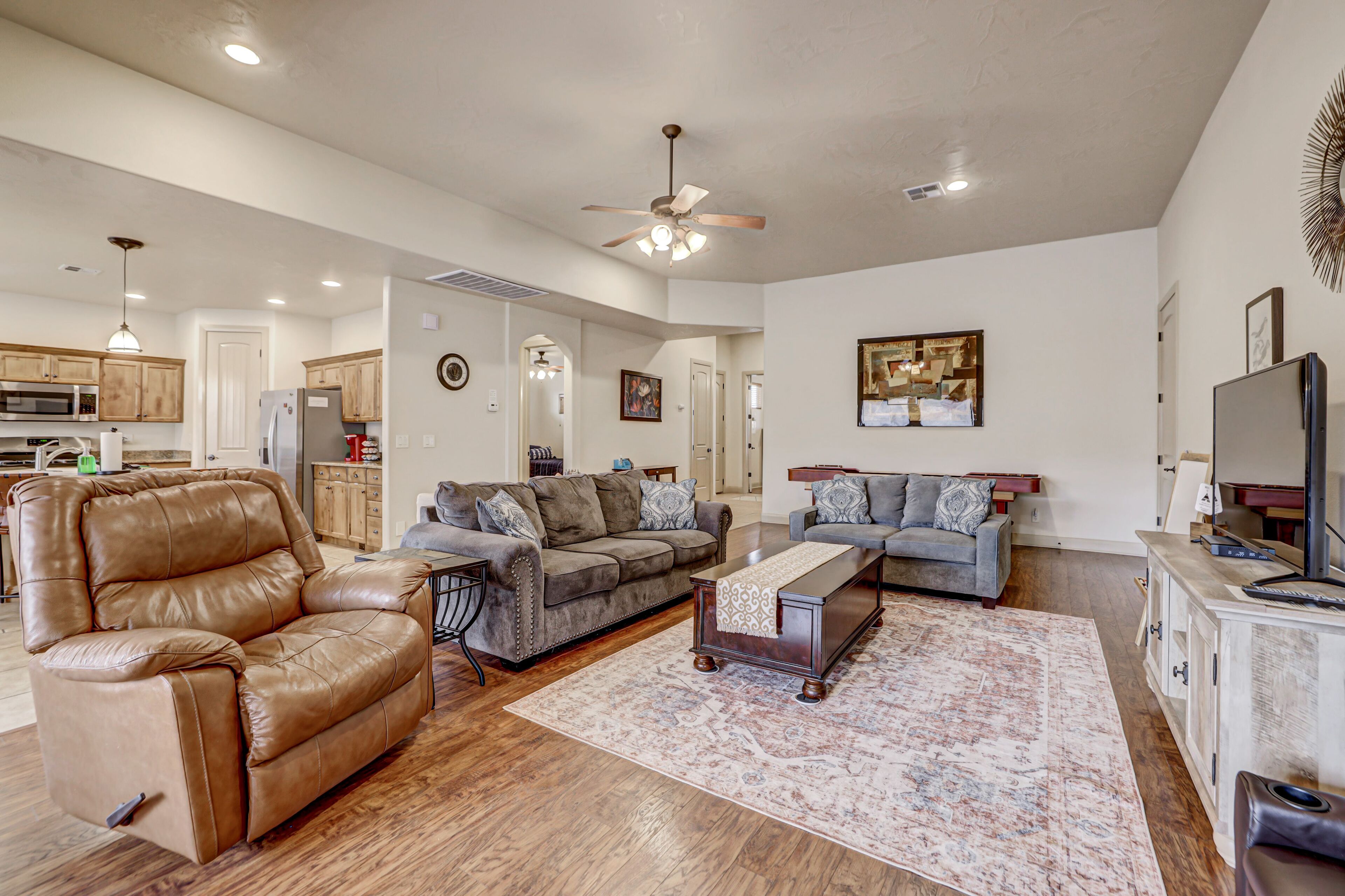 A super variety of games, golf cart & scooter, & unique decor in plush comfort!