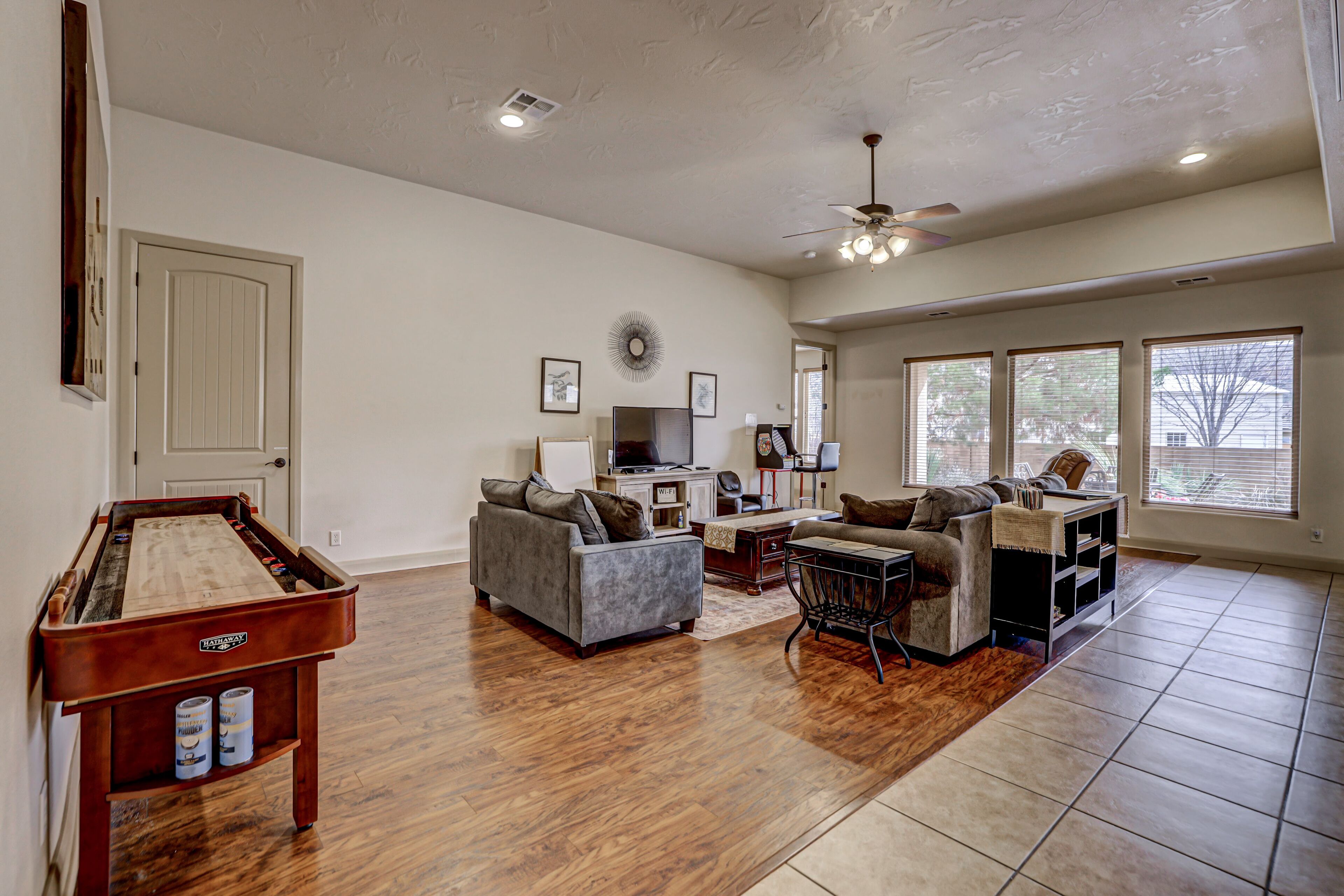 A super variety of games, golf cart & scooter, & unique decor in plush comfort!