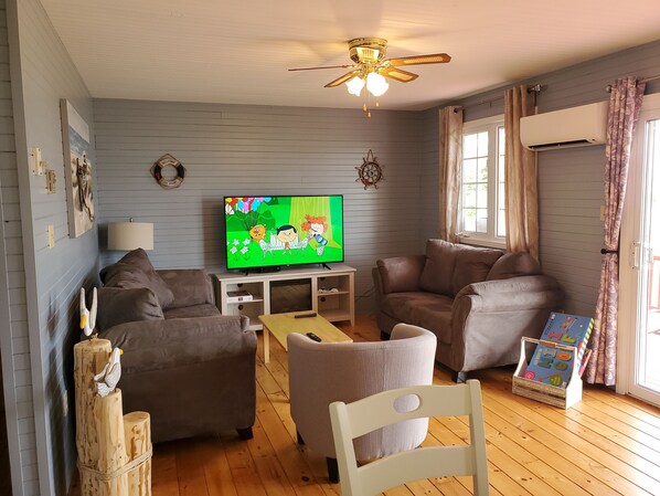 TV - "New Renovated Refreshing 3 Bedroom 1 Bath Cottage" (Mount Stewart)