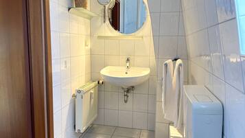 Ducha, secador de pelo, toallas