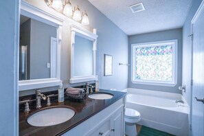 Hair dryer, towels, soap, shampoo