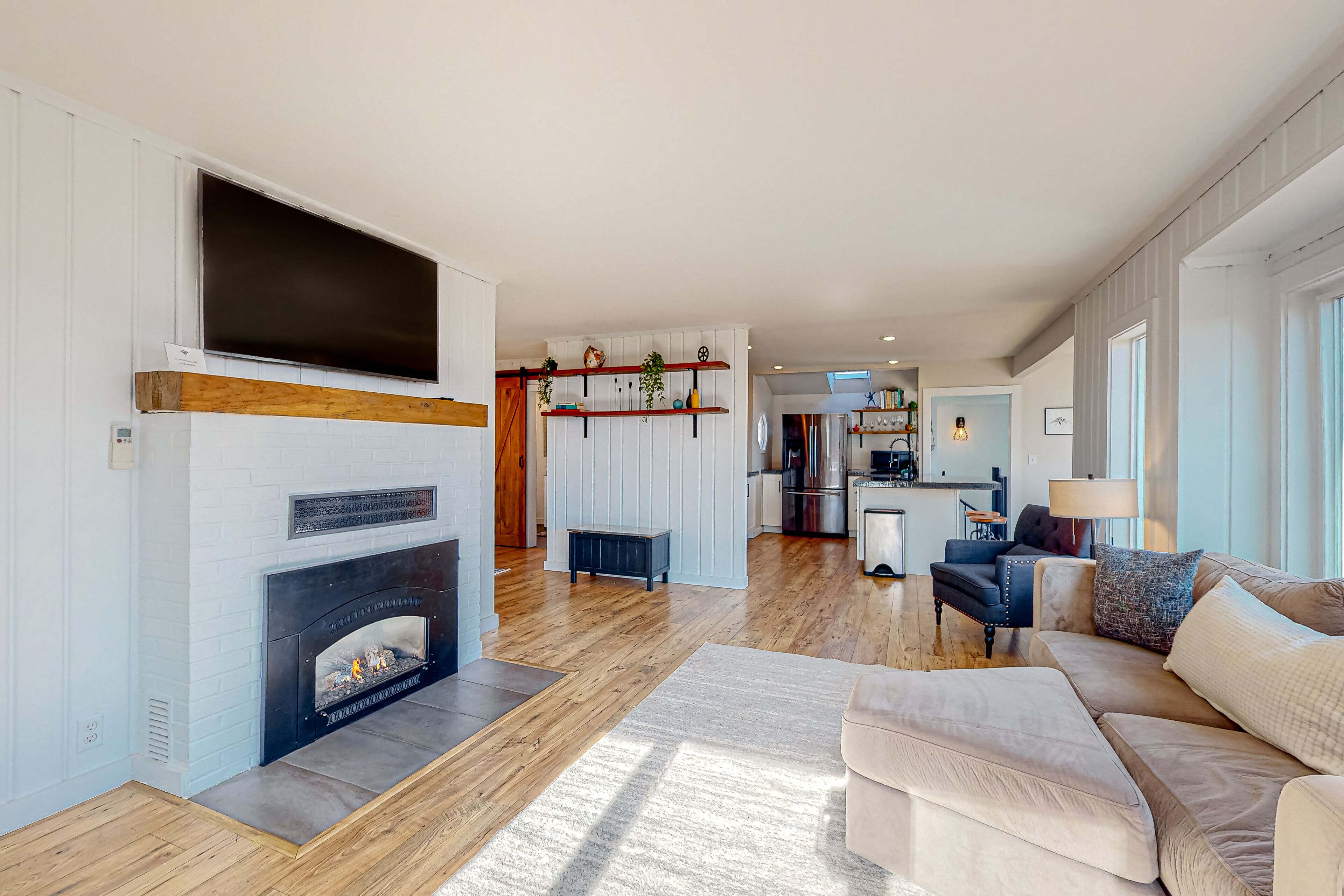 Charming 1940s abode with hot tub, grill, fireplace, & game room - beach access