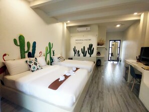 Family Triple Room | Free minibar items, individually decorated, desk, laptop workspace - Phattalung Meridian (Phatthalung)