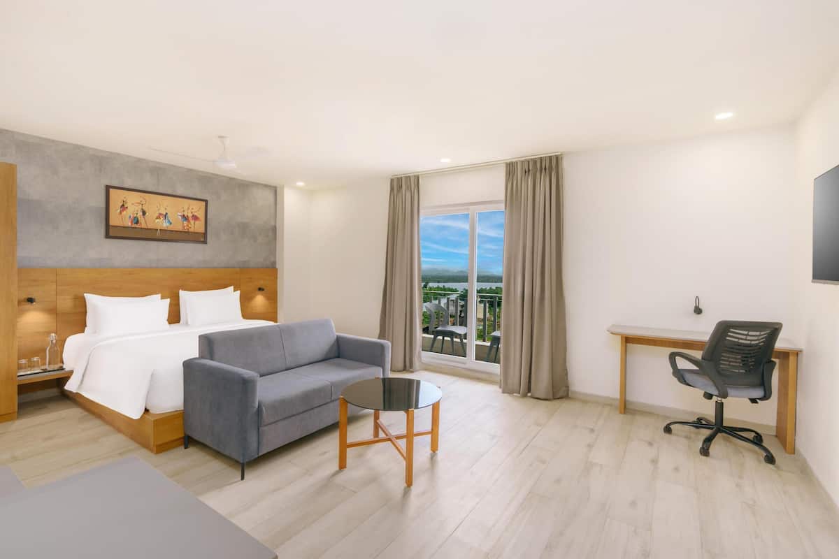 Suíte família, sacada, vista para o rio | 1 quarto, roupas de cama de algodão egípcio, roupas de cama premium