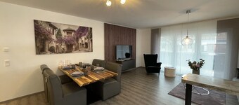 Modern and centrally located holiday apartment with a large balcony.