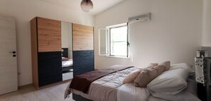 1 camera, ferro/asse da stiro, Wi-Fi gratuito, lenzuola