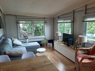 Spacious caravan with fixed awning and sheltered garden