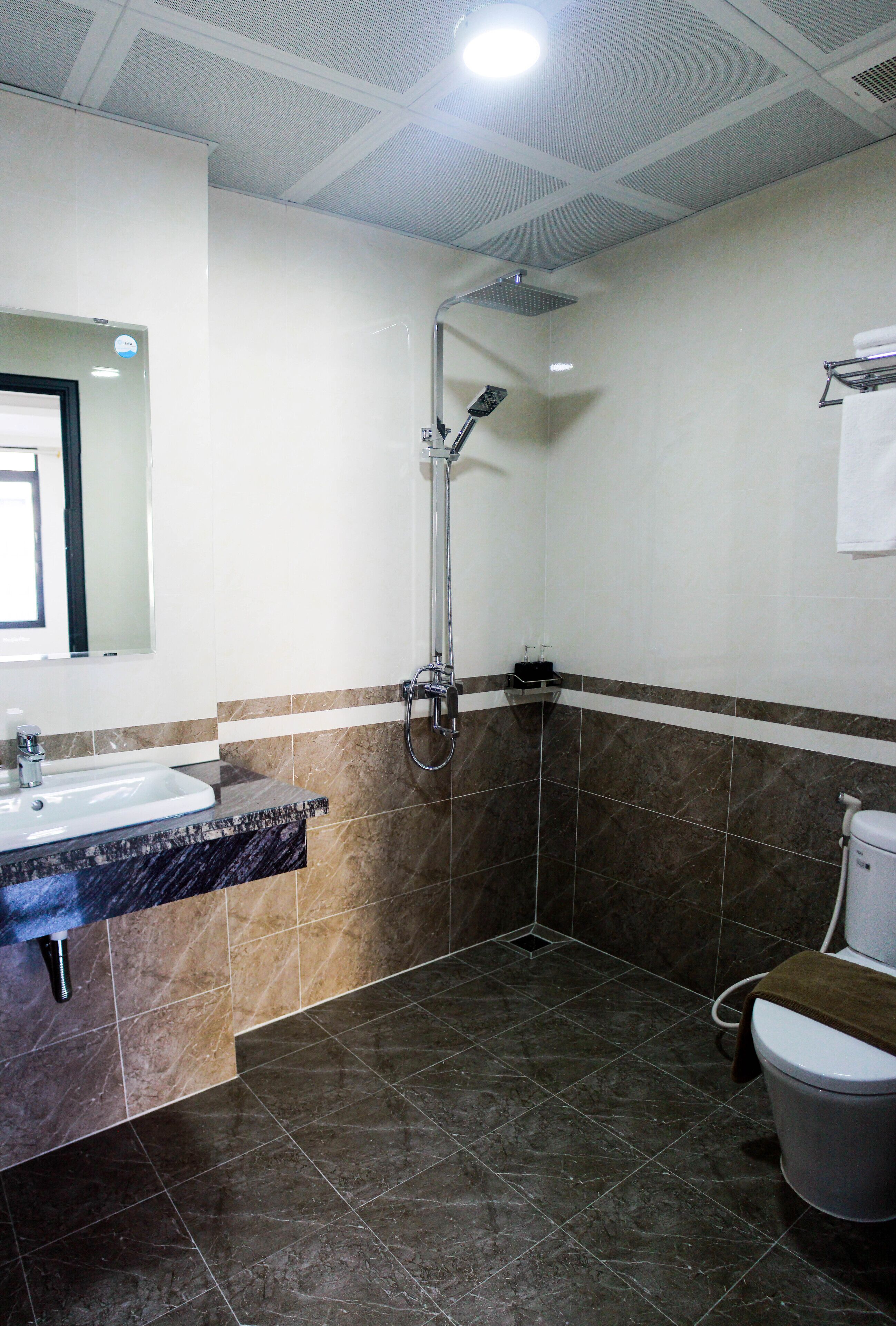 Rainfall showerhead, hair dryer, slippers, towels