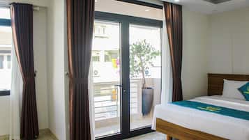 Habitación Confort con 1 cama matrimonial o 2 individuales | Escritorio, wifi gratis y ropa de cama