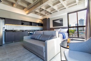 Studio | Living area | TV - Condomínio TOLIVE One Housi by Carpediem (Recife)