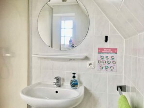 Een douche, een haardroger