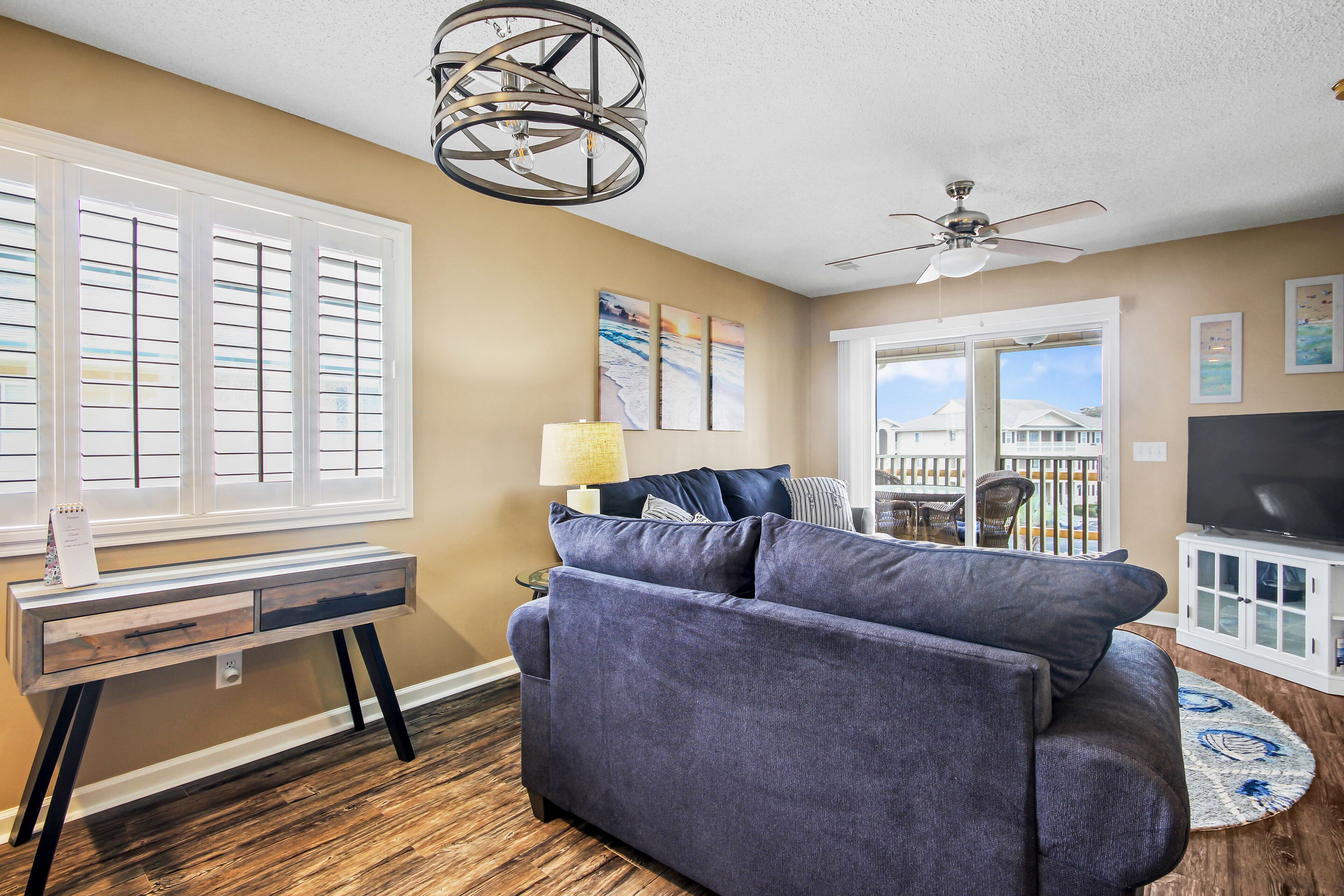 Sunny retreat near the beach with modern updates & AC - hot tub and pool access