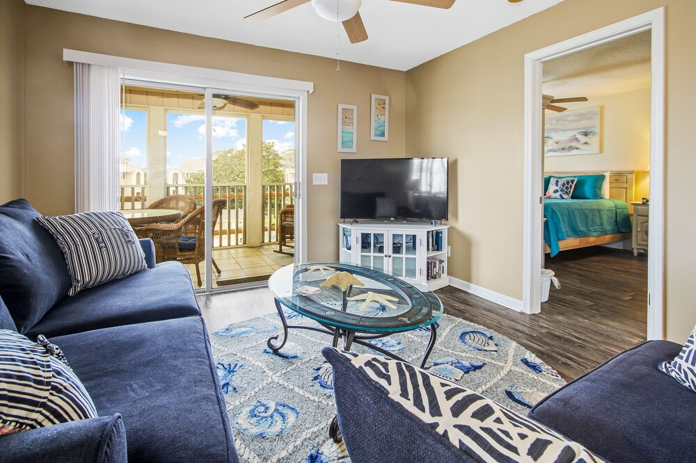 Sunny retreat near the beach with modern updates & AC - hot tub and pool access