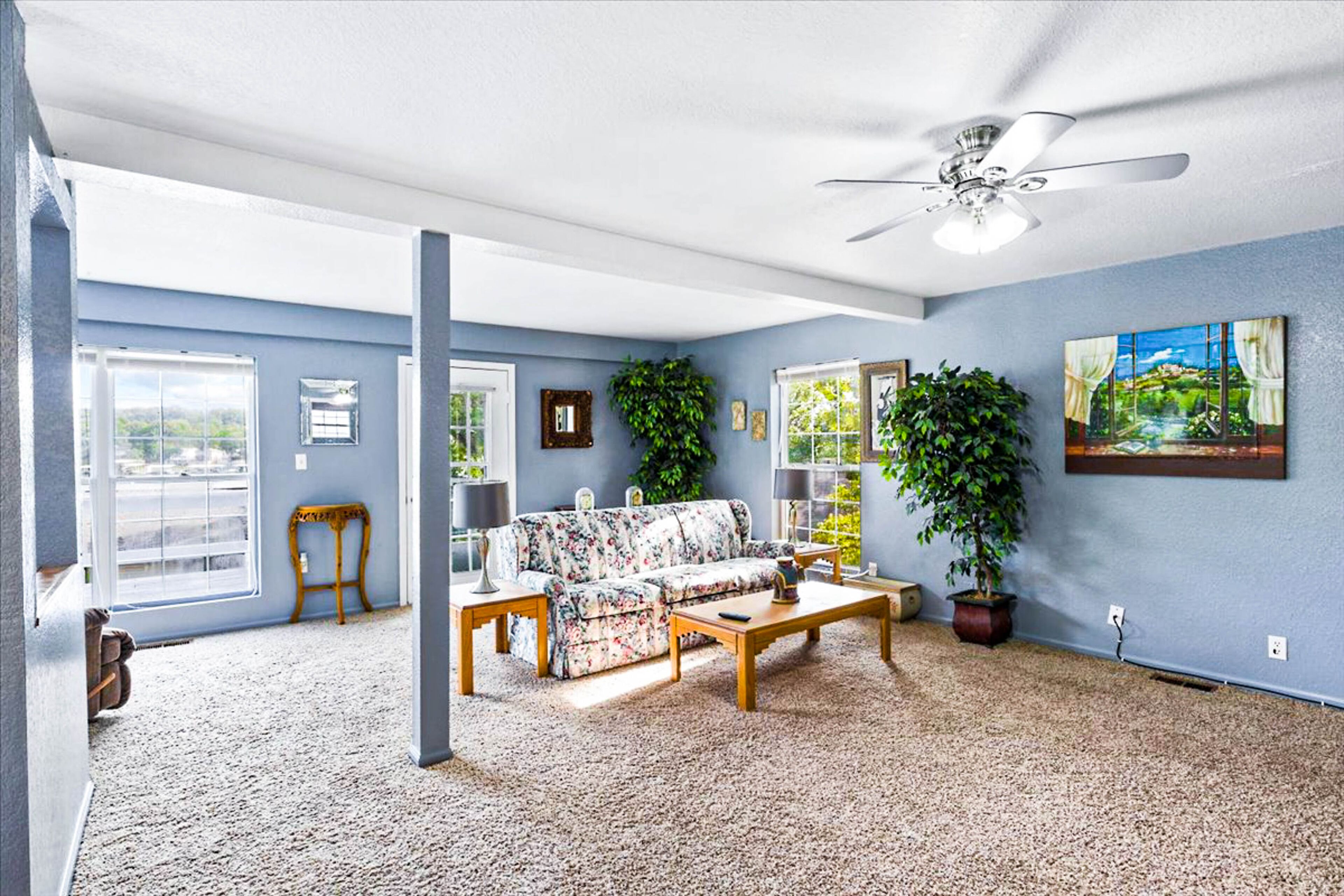 2-story home near the water with lake views, fireplace, deck, grill, & AC