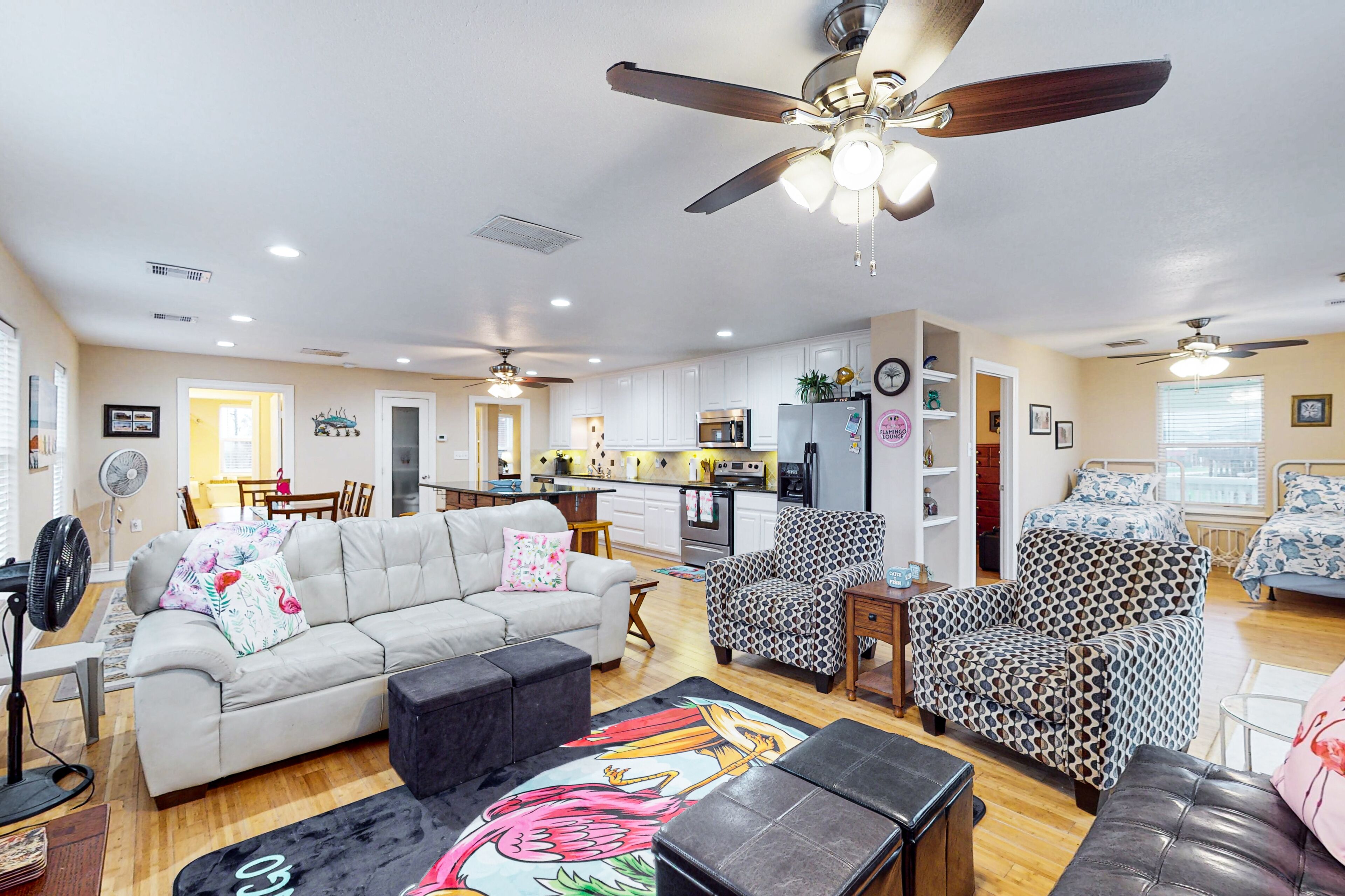 Colorful beachfront stay with scenic balconies, gas grill, W/D, & AC - dogs ok