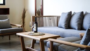 Family Apartment | Living area | 32-inch flat-screen TV with cable channels, TV