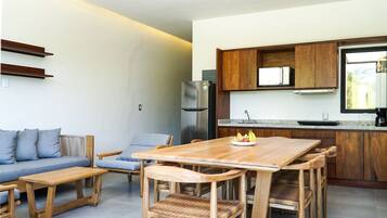 Family Apartment | Living area | 32-inch flat-screen TV with cable channels, TV